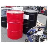 Two Metal 55 gallon Drums