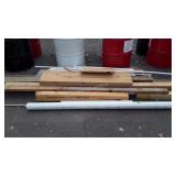 Miscellaneous lumber pile with a few pcs of PVC