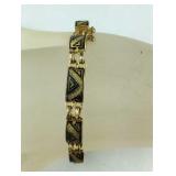 Goldtone enameled bracelet 7in