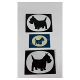 Three enameled Scottish Terrier wall hangings