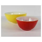 Pyrex mixing bowls, yellow 10" and faded red 7"