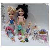 Toys, dolls and barbies, with carriage and some