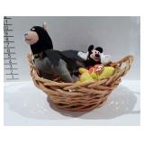 Basket of toys, includes Mickey Mouse, batman dog
