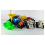 Toy lot, trucks and boats. All in used condition.