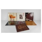 Seven vinyl records, all Chicago and Robert Lamm