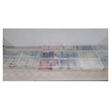 Art supplies, Sixteen organizers full of beads,