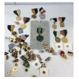 Award medals and various pins