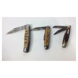 Three pocket knives, Red Deere, Old Timer, and