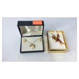 Hummingbird brooch and a gold filled floral