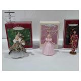 Three hallmark keepsake barbie ornaments in