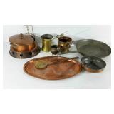 Assorted brass and copper wares.