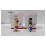Two The Peanuts Hallmark keepsake ornaments,