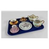 Tea group, cups & saucers,  teapot stand and