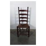 Ladder back chair with woven seat
