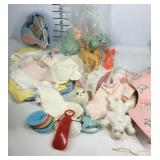 Older baby clothes, brush set, and toys