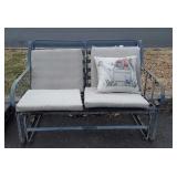 Metal framed patio glider, 4 ft width, some rust