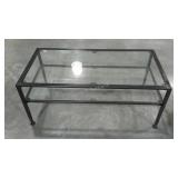 Two tier glass topped coffee table