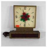Lighted wall clock, red light in base lights, bit