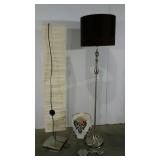 Two floor lamps and a table lamp