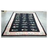 Area rug, 75 x 104, striking floral design on