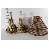 Figural doll lamps with shades, both missing