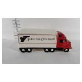 Feed the children ceramic hauler cookie jar