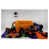 Halloween decorations,  tote full of treat bags,