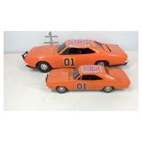 Two Ertl General Lee toy cars