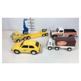 Tonka action car and three Buddy L trucks, Dr.