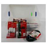 Tote full of extension cords, holiday lights and