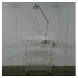 Clear acrylic stand on wheels and an adjustable