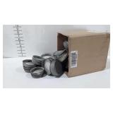 Box of zinc canning lids with milk glass inserts