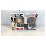 Two pop Star Wars vinyl bobble heads Rey and