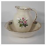 Rose design pitcher and basin, some age wear as