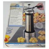 Wilton cookie press, box is dirty, but contents