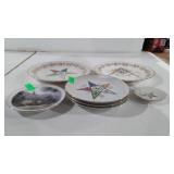 Seven plates, one Thomas Kinkade, two Sanders MFG