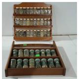 Two spice racks with spices