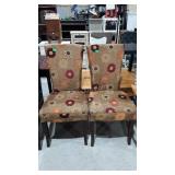 Two floral upholstered dining chairs