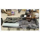 Fish theme decorations: sign, mirrored fish, twig