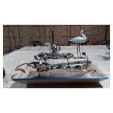 Nautical decor, includes ceramic shore bird, wall