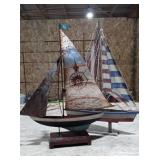 Two model boats, metal and wooden