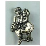 Sterling silver pin boy and girl