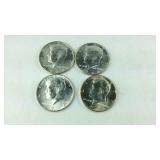 Four 1964 Kennedy Half Dollars