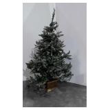 Pre-lit Christmas tree with planter stand,