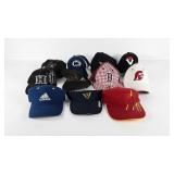 Ten sports team hats and a visor, including