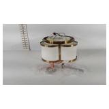 Shaded light fixture with natural brass finish,