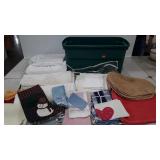 Textiles, embroidered tea towels, placemats,