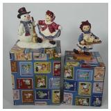 Two Enesco Raggedy Ann and Andy figurines,