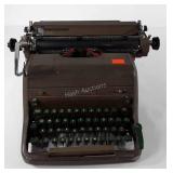Royal typewriter, keys move, ribbon tangled