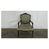 Tufted arm chair, solid piece but upholstery